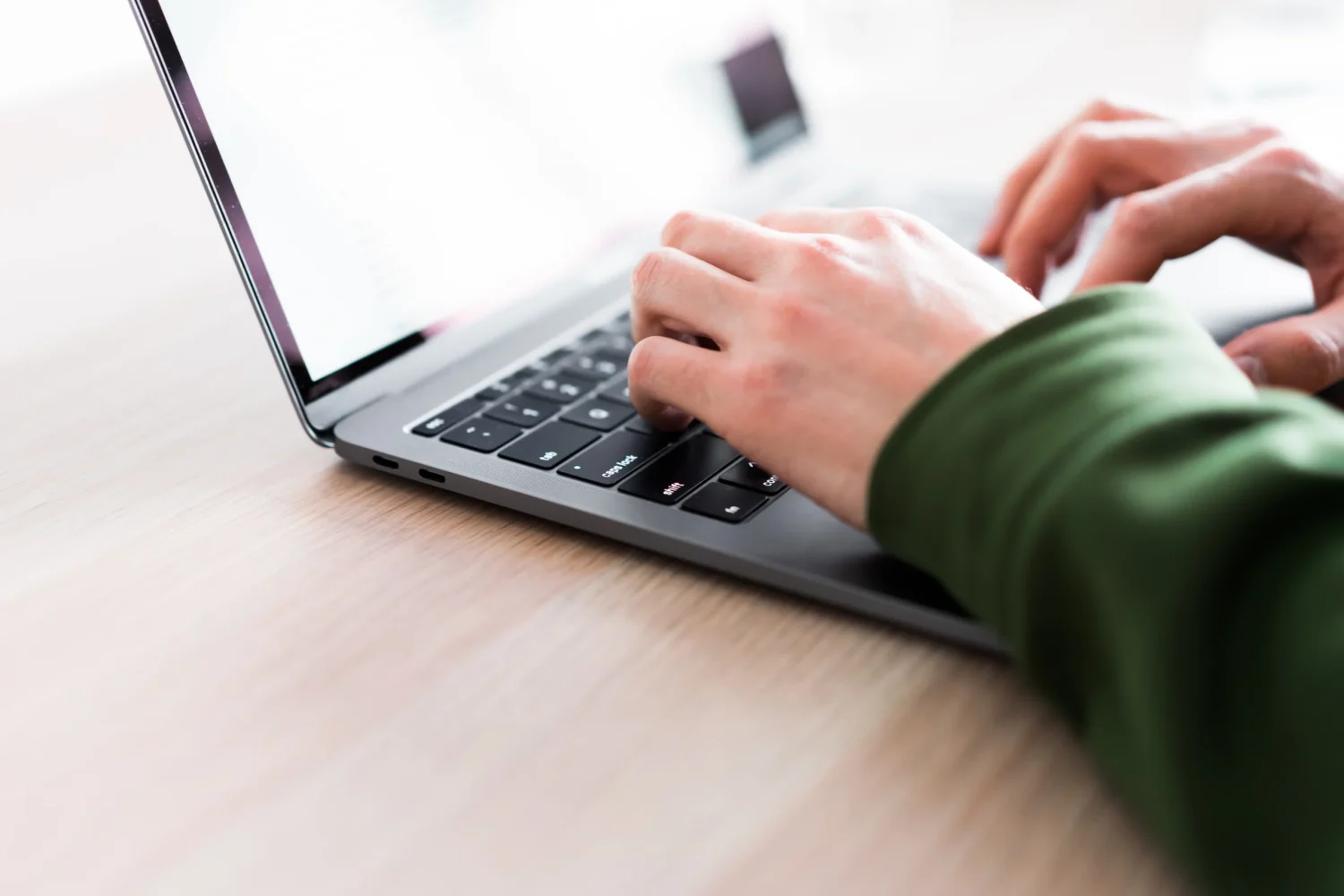 man-working-on-his-laptop-computer-picjumbo-com